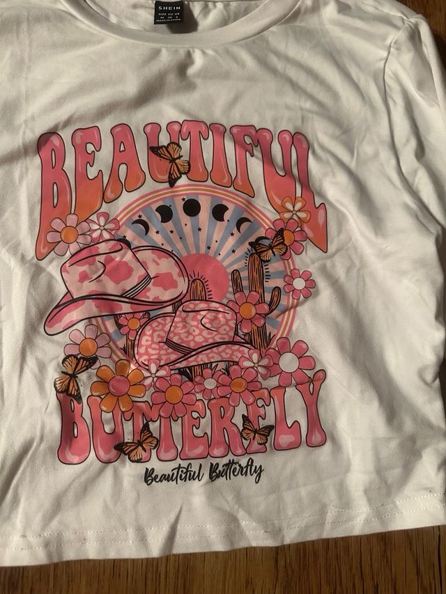 Camisetas manga largas cuello alto rosa