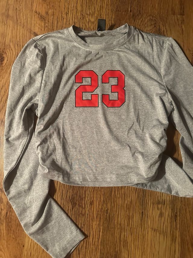 Camisetas manga largas cuello alto rosa