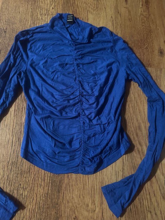 Camisetas manga largas cuello alto rosa