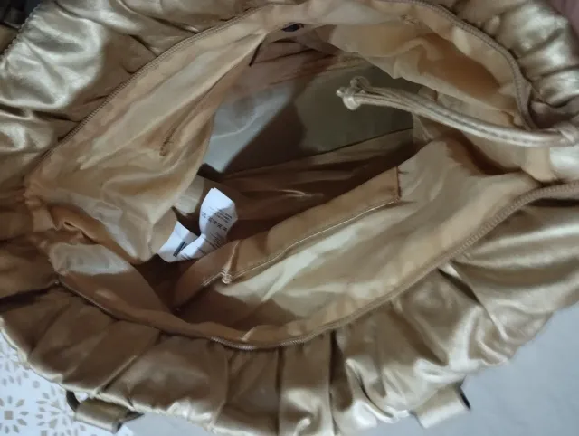 Bolso dorado de hombro