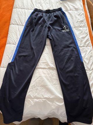 Pantalón deportivo azul y blanco
