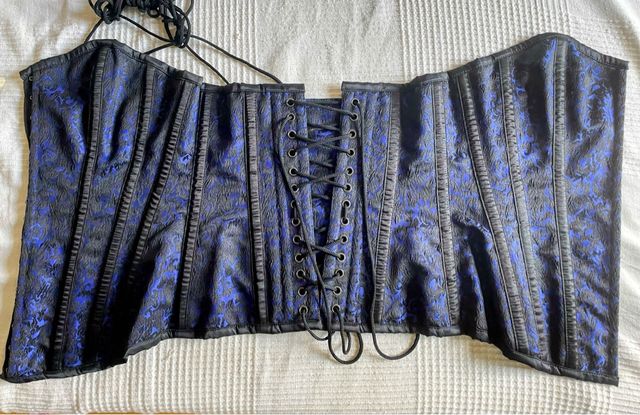 Corpiño negro y azul con cordones(usado solo1 vez)