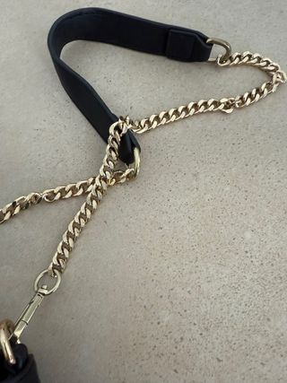 Bolso Parfois negro y dorado