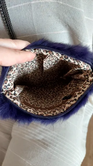 Bolso pelo sintético morado