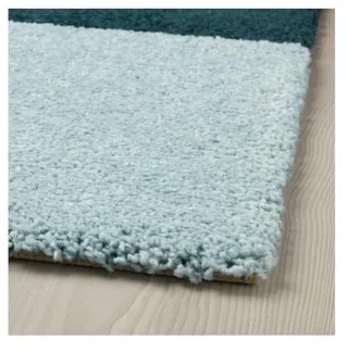 Alfombra Kongstrup Ikea 2 tonos de azul.