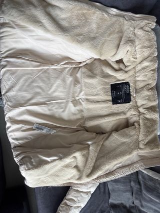 Plumas niña beige