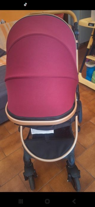 Trio passeggino rosso e oro
