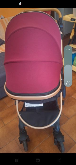 Trio passeggino rosso e oro