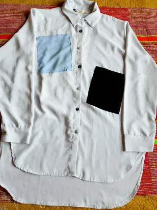 Camiseta larga blanca con bolsillos