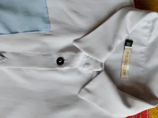 Camiseta larga blanca con bolsillos