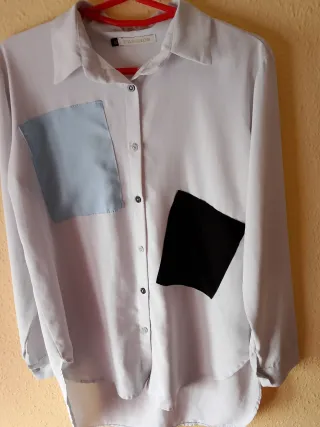 Camiseta larga blanca con bolsillos