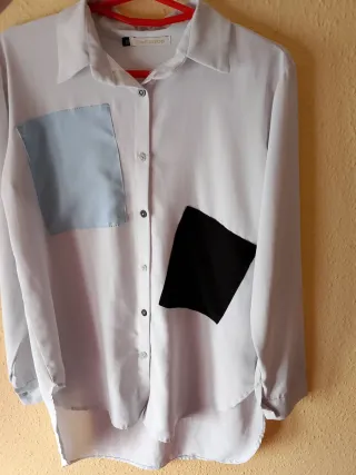 Camiseta larga blanca con bolsillos