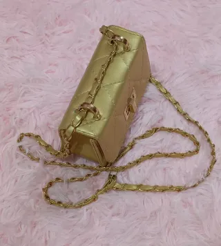Mini bolso dorado
