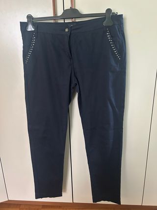 Pantaloni donna blu con borchie