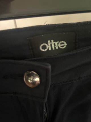 Pantaloni donna blu con borchie