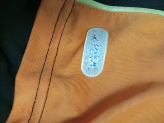 Completo calcetto Legea arancione/nero