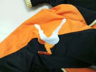 Completo calcetto Legea arancione/nero