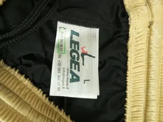 Completo calcetto Legea arancione/nero