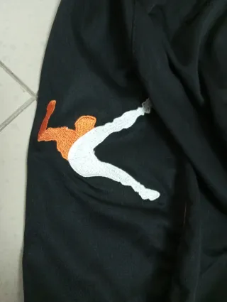 Completo calcetto Legea arancione/nero