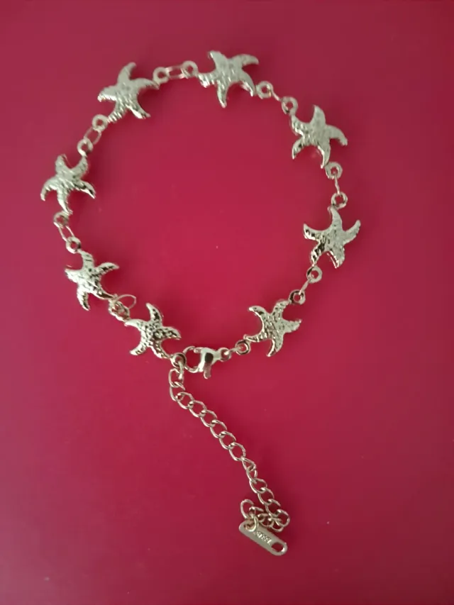 Pulsera chapada en oro 18k con estrellas de mar