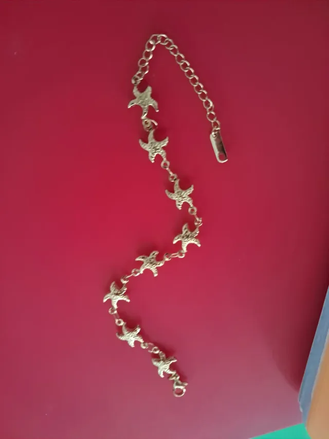 Pulsera chapada en oro 18k con estrellas de mar