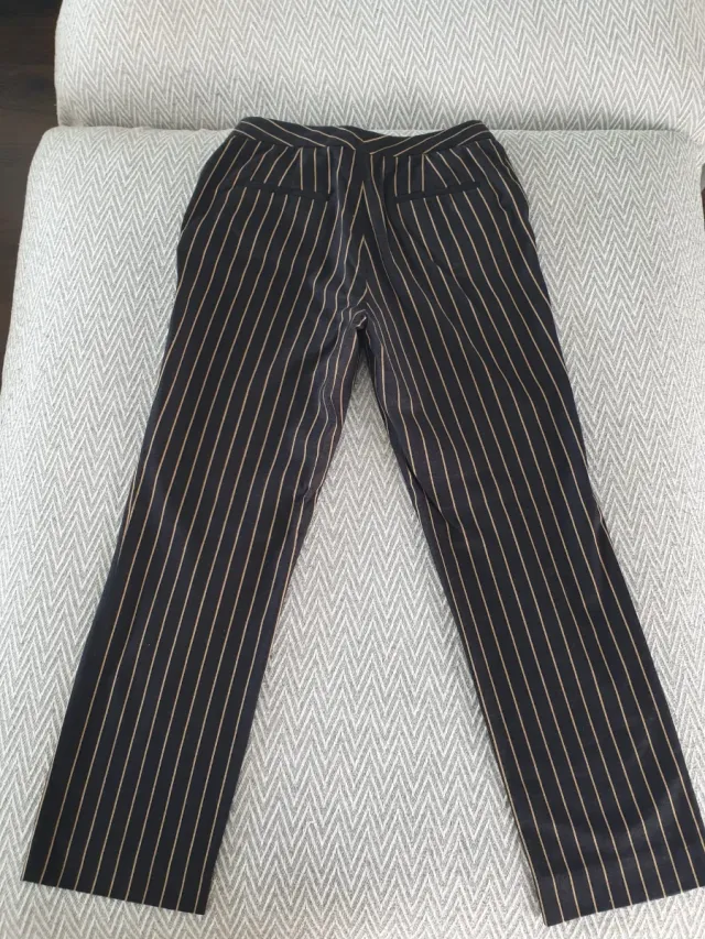 Pantalón rayas Massimo Dutti negro y beige