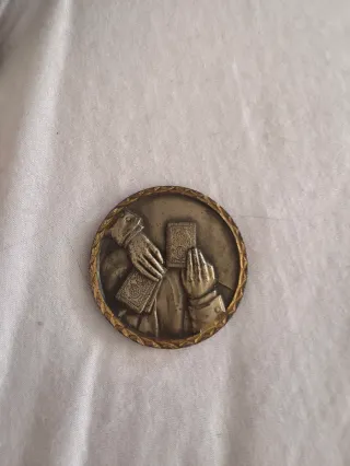 Moneda de bronce antigua