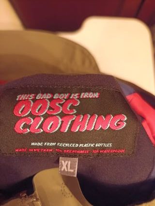 Chaqueta OOSC verde y naranja