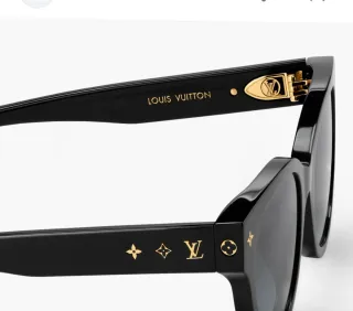 Gafas de sol Louis Vuitton negras y doradas 
