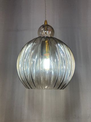 Lampadario sfera vetro plissettato ambra