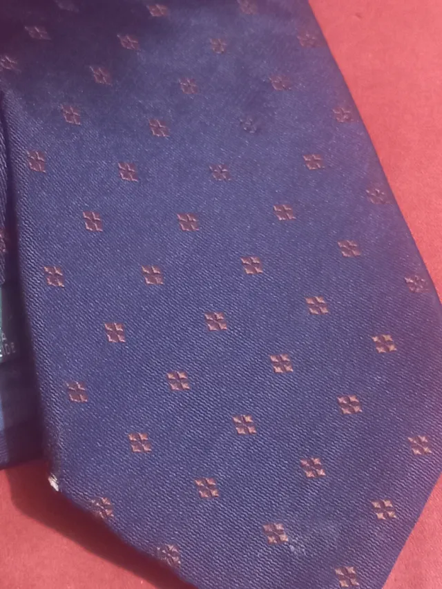 Cravatta Seta Blu con Microdisegno arancione.