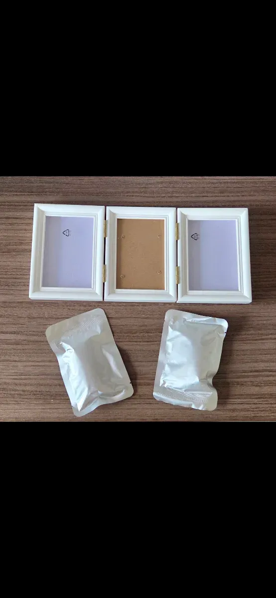 Marco huellas y foto bebé