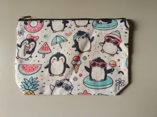 Neceser de tela con estampado de pingüinos
