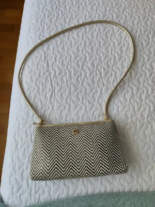 Bolso bandolera dorado y negro