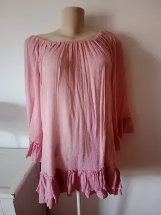 Blusa rosa con volantes