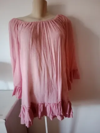 Blusa rosa con volantes