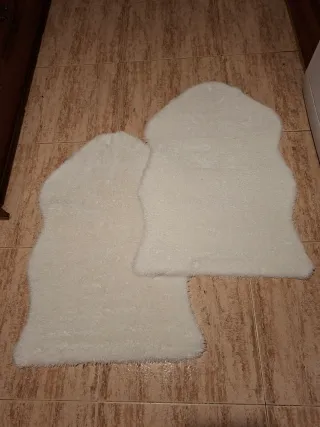 Alfombras de pelo blanco para pie de cama
