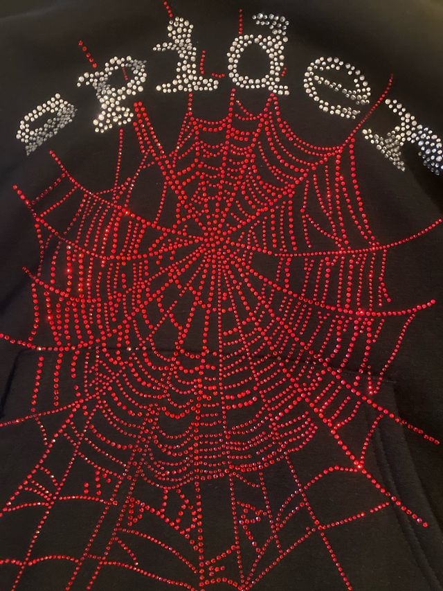 Sudadera SP5DER negra y roja