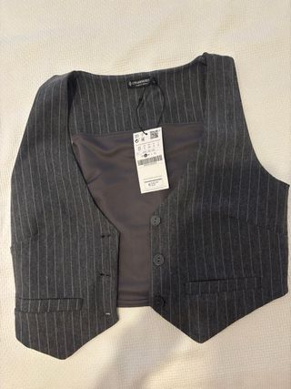 Mono corto marrón adolescente