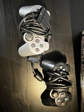 Consola PlayStation 2 con juegos