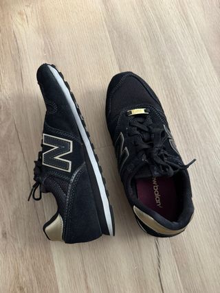 New Balance 373 negras y doradas originales