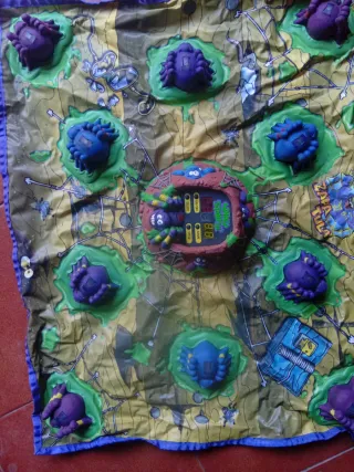 Manta de juegos con arañas