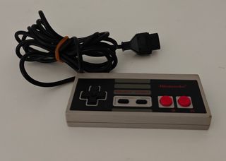 Nintendo NES + juego + mando