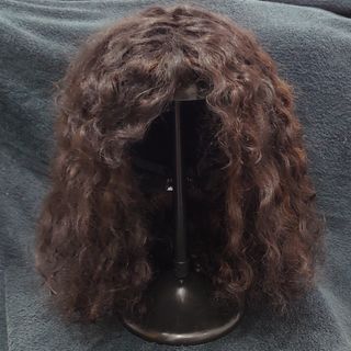 Peluca natural Castaña Ondulada.