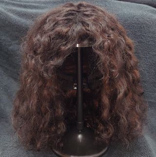 Peluca natural Castaña Ondulada.