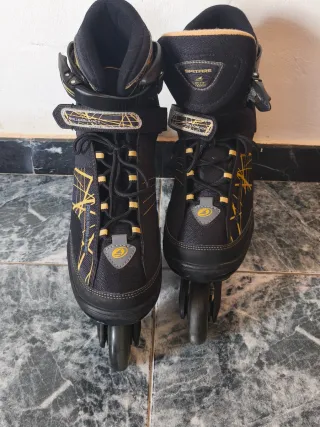 Patines en línea Rollerblade negros y dorados