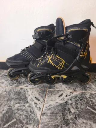 Patines en línea Rollerblade negros y dorados