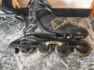 Patines en línea Rollerblade negros y dorados