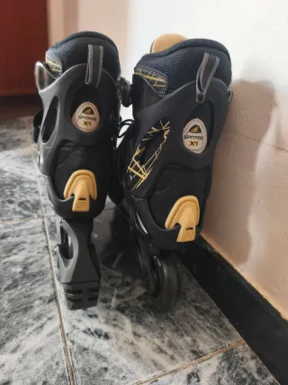 Patines en línea Rollerblade negros y dorados