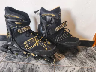 Patines en línea Rollerblade negros y dorados